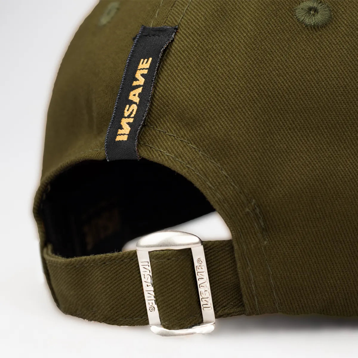 KHAKI BASEBALL CAP WITH "И" PATCH.